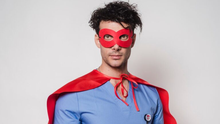 Male nurse in superhero halloween costume.
