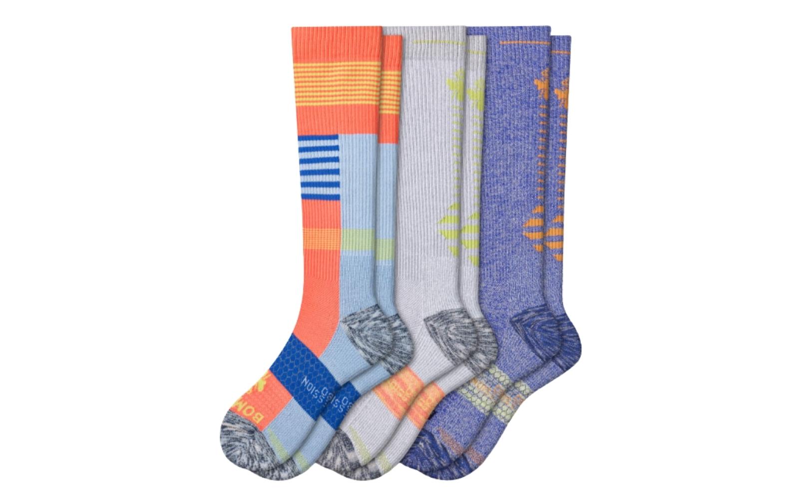 Colorful patterned Bombas performance compression socks.