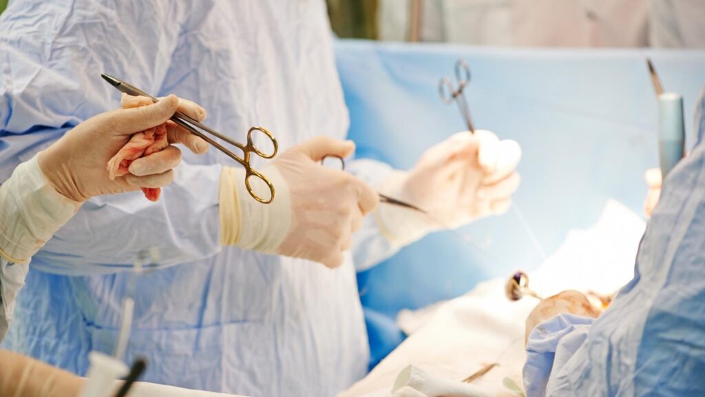 Surgery taking place in an operation room.