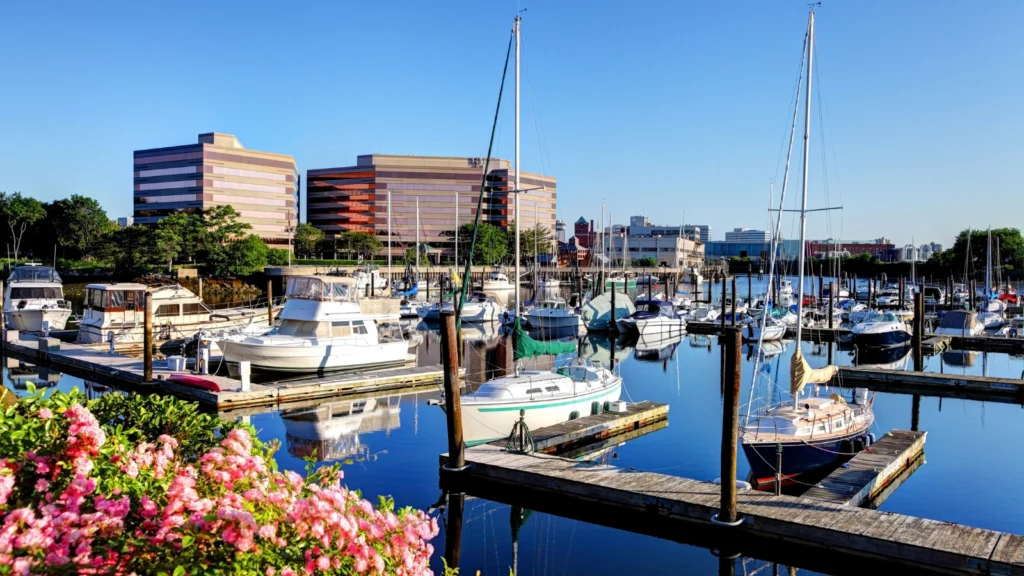 Overview of a harbor full of boats and travel nurse housing in Connecticut