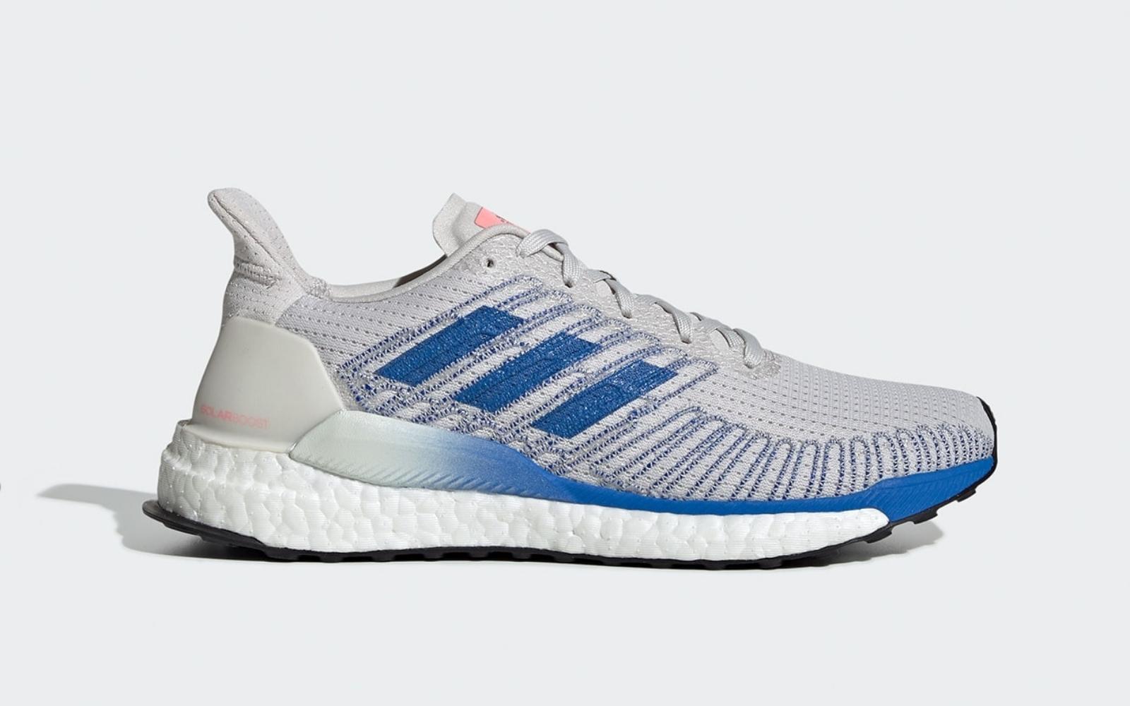 Blue and white Adidas nursing shoes.